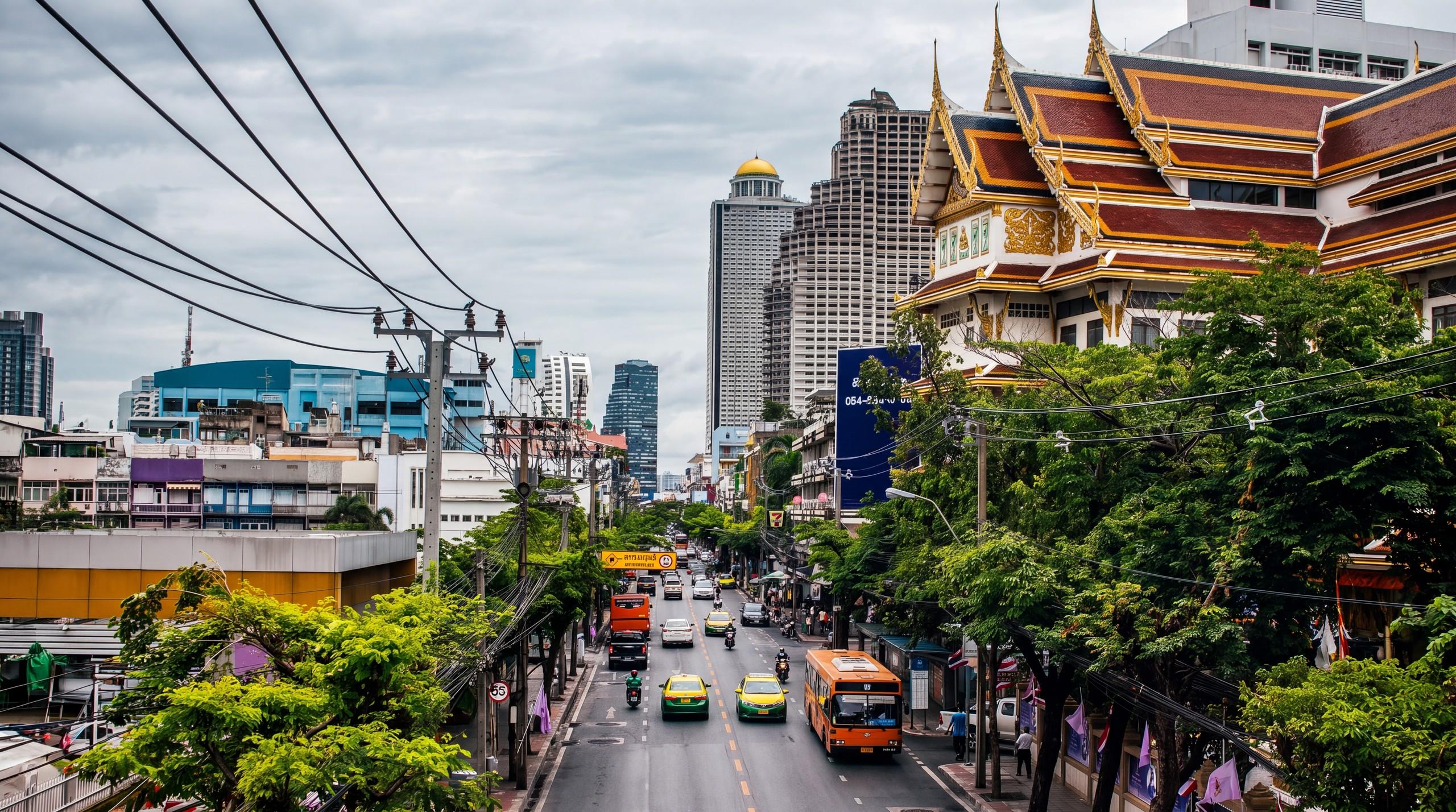Street-level Bangkok in motion: rail, a lived-in streetscape and everyday movement in one frame